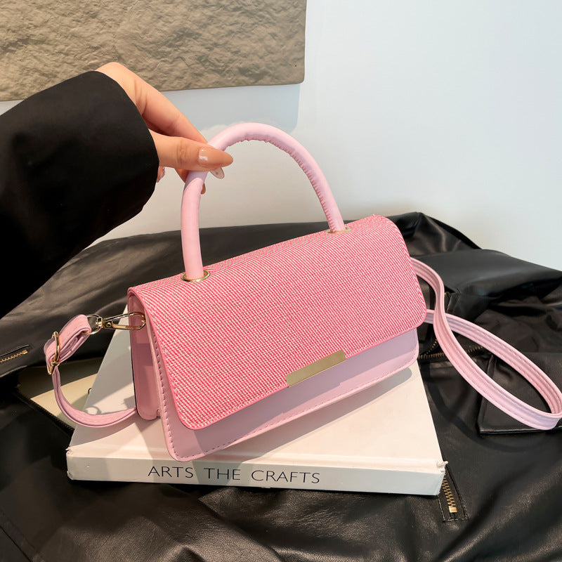 Bolso de mano con costuras abatibles de moda - Tendencia urbana