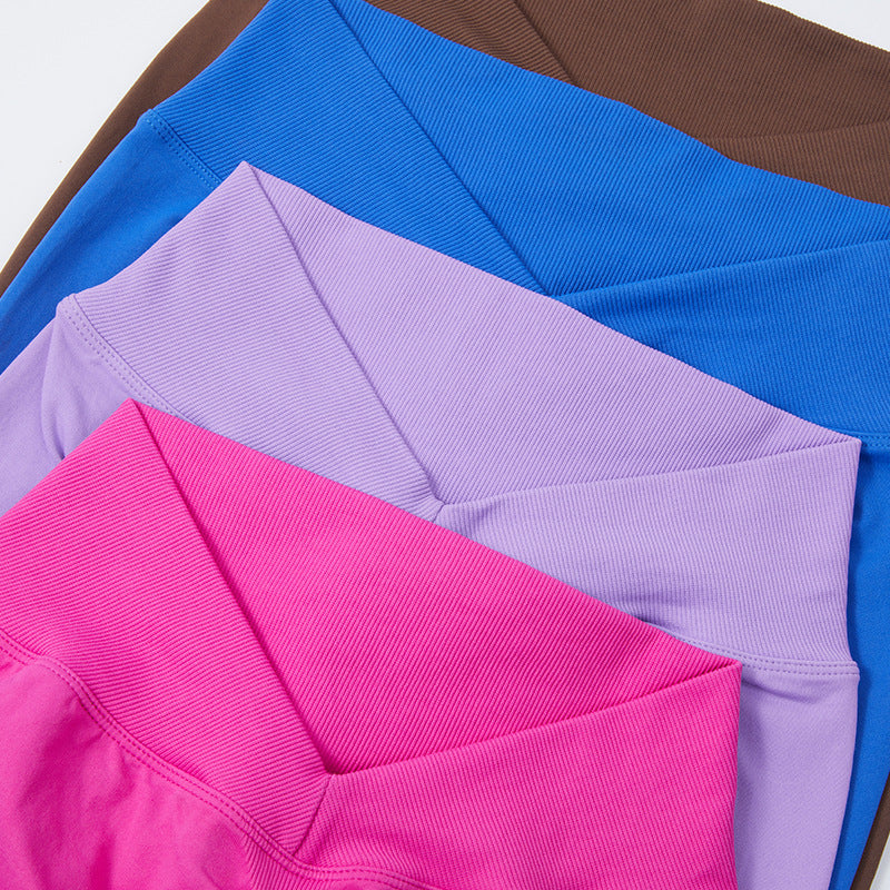 Leggings de yoga taille haute à la mode pour femmes, couleur unie