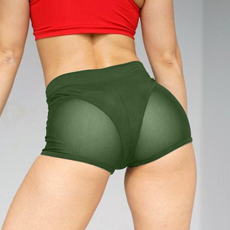 Pantalones cortos deportivos casuales de malla con costuras de color sólido para mujer