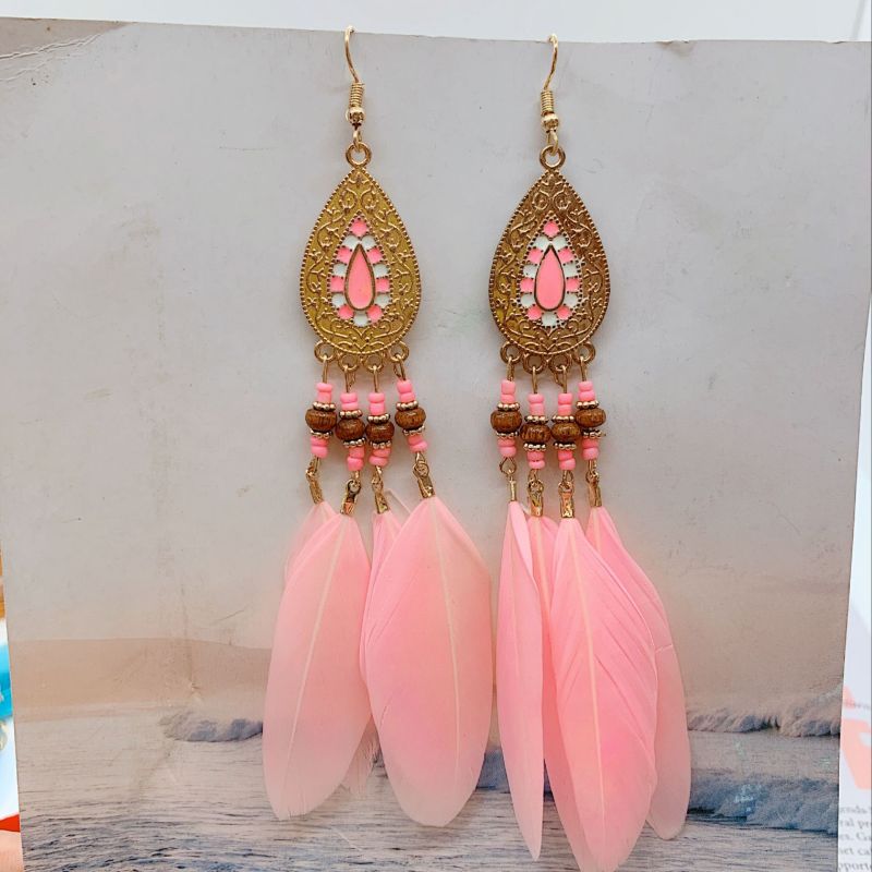 Boucles d'oreilles pendantes bohèmes vintage en perles et plumes