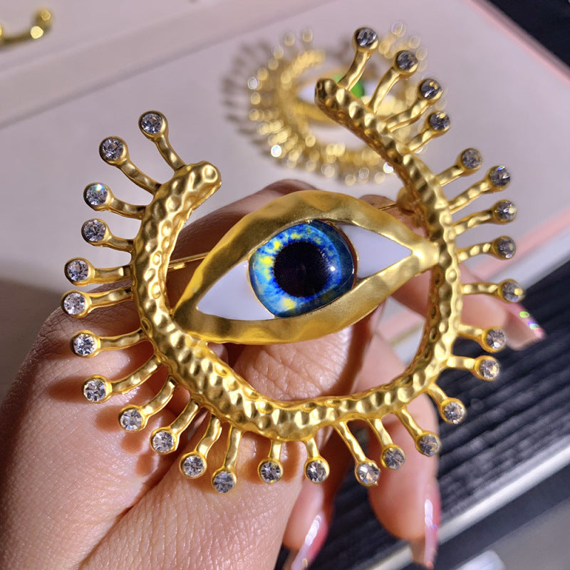 Broche rétro exagérée œil du diable pour femme