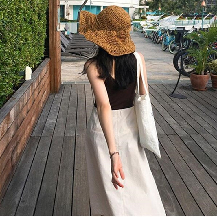Chapeau de soleil ajouré en paille fait main pour femme