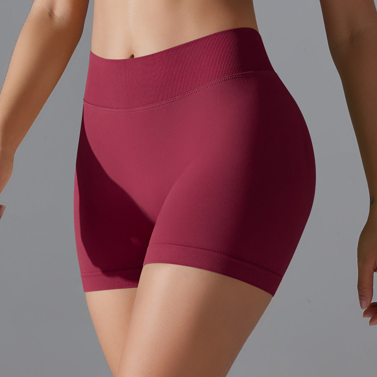 Pantalones cortos deportivos de yoga de color sólido sin costuras sexys para mujer