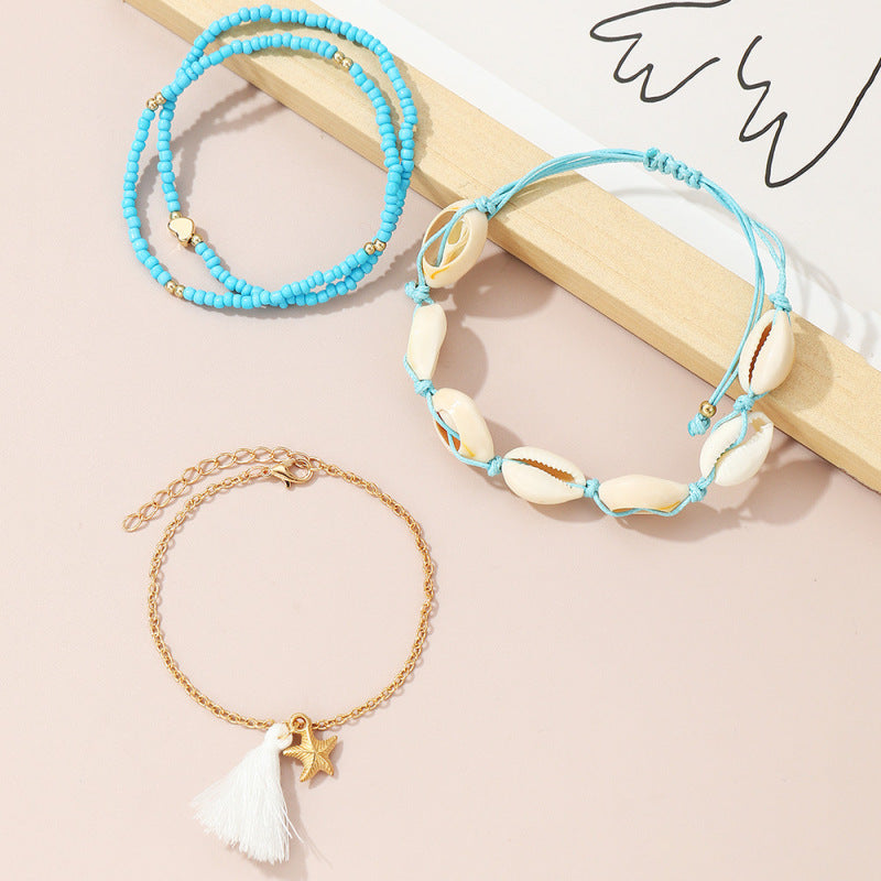 Conjunto de tobilleras bohemias multicapa con cuentas y conchas