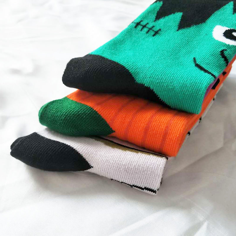 Chaussettes unisexes motif citrouille d'Halloween avec des yeux amusants