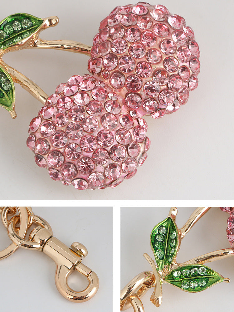 Llavero con colgante de cereza y diamantes de imitación rosas para mujer