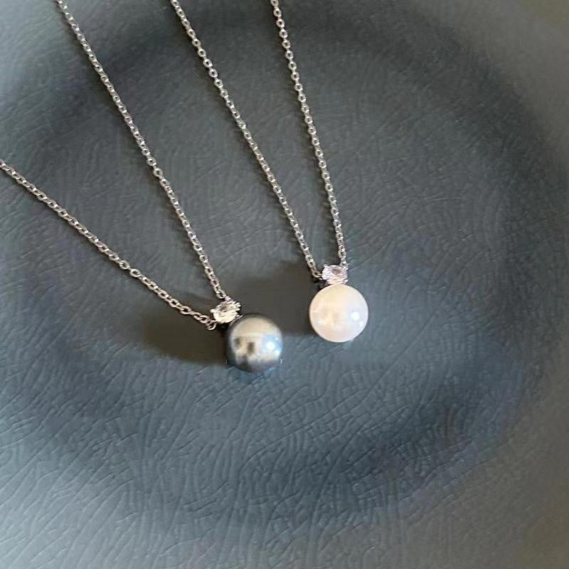 Collar elegante con colgante de circonita y perla para mujer