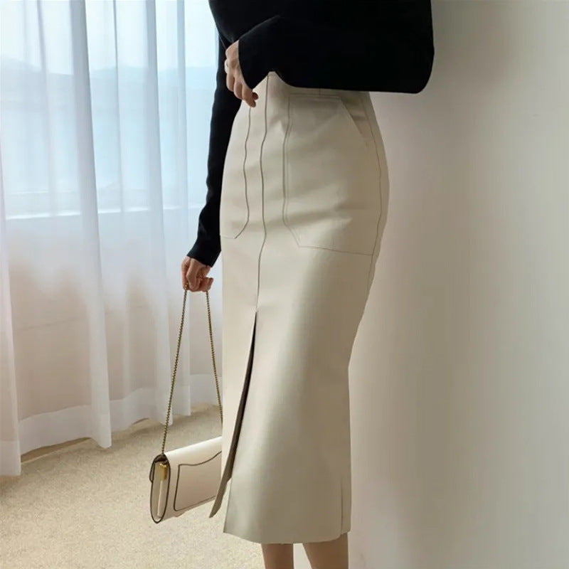 Falda dividida de cuero PU de color sólido sexy de moda para mujer