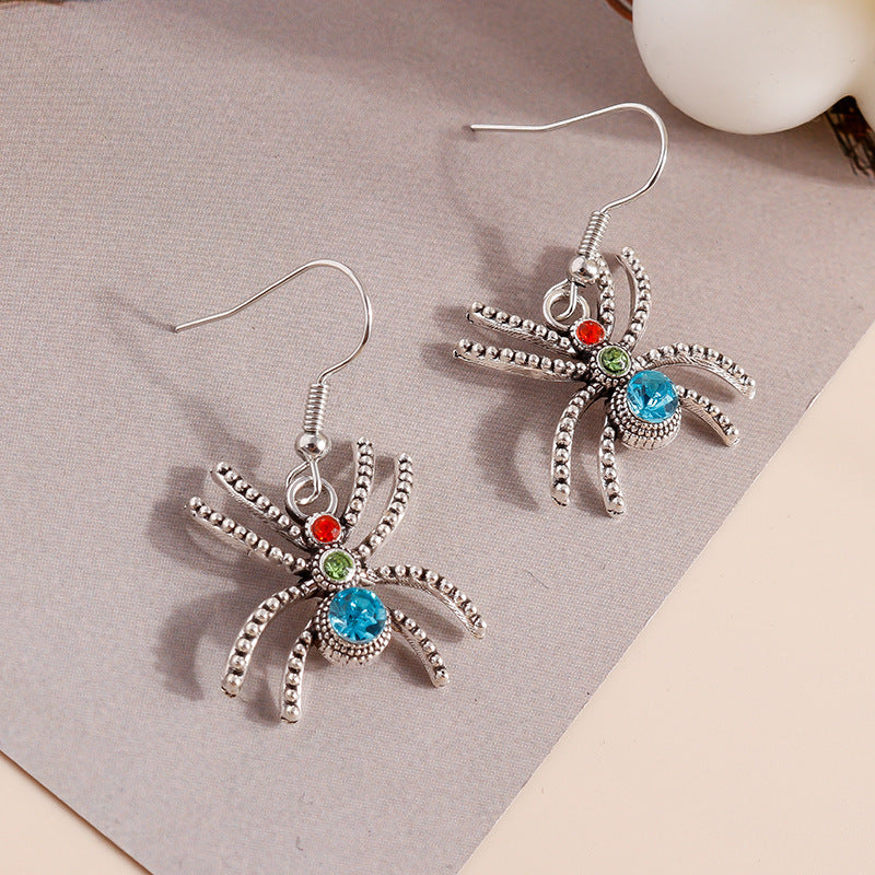 Pendientes colgantes de metal con diseño de araña de Halloween y diamantes de imitación multicolor