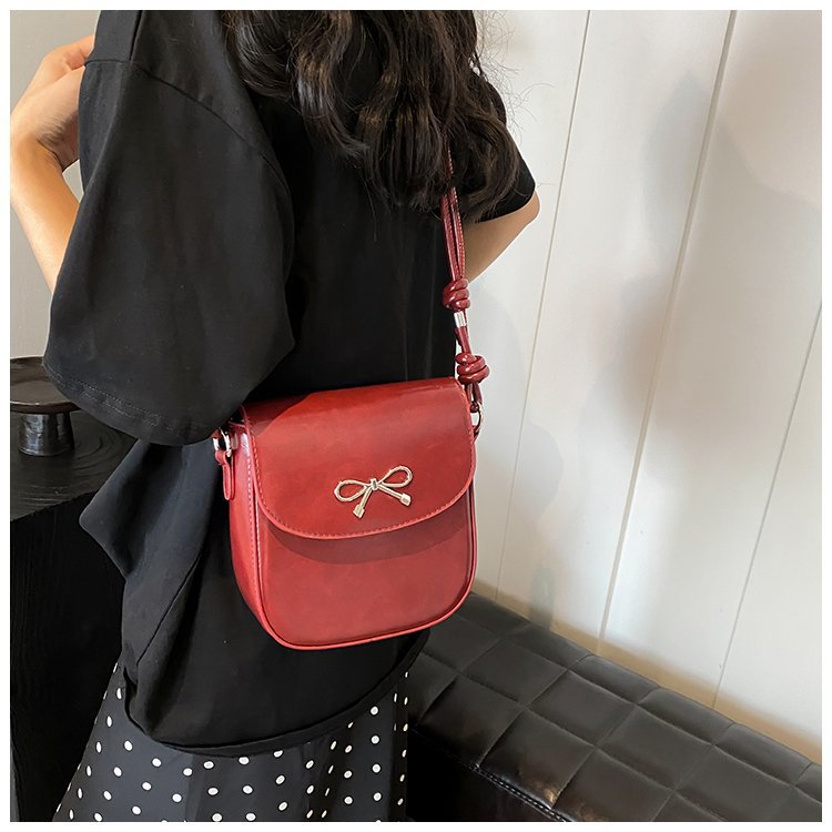 Mini bolso bandolera con lazo de color liso a la moda