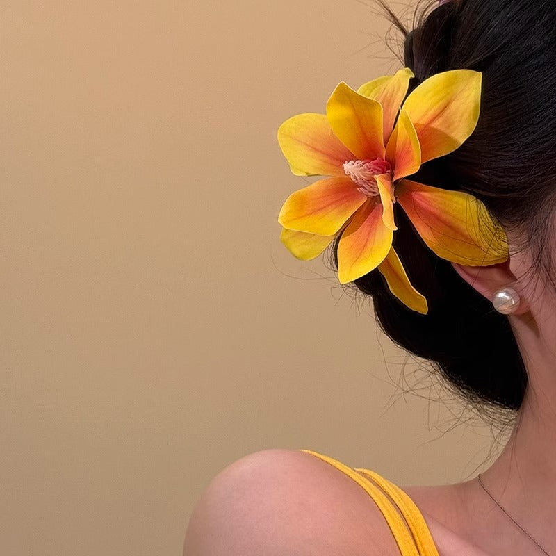 Horquilla floral amarilla para vacaciones en la playa