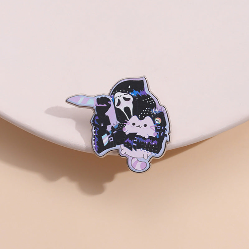 Broche en forme de chaton tenant un fantôme de dessin animé pour Halloween