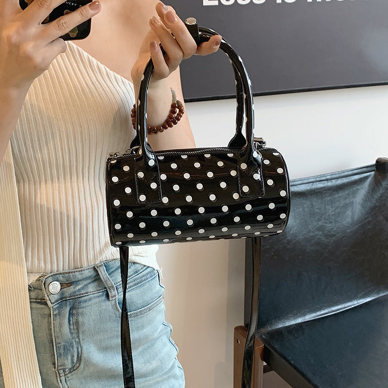 Bolso de hombro cilíndrico portátil con punta ondulada de moda