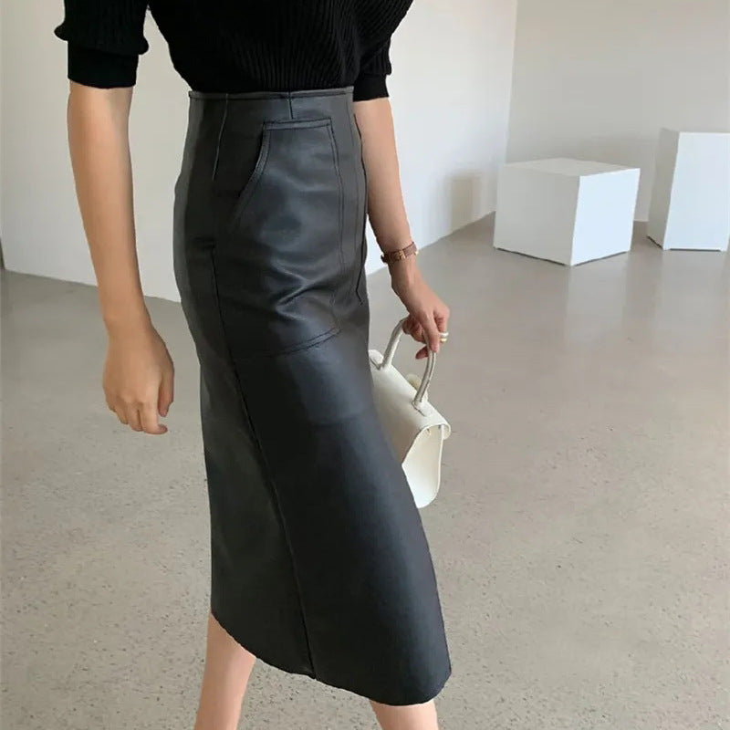 Falda dividida de cuero PU de color sólido sexy de moda para mujer