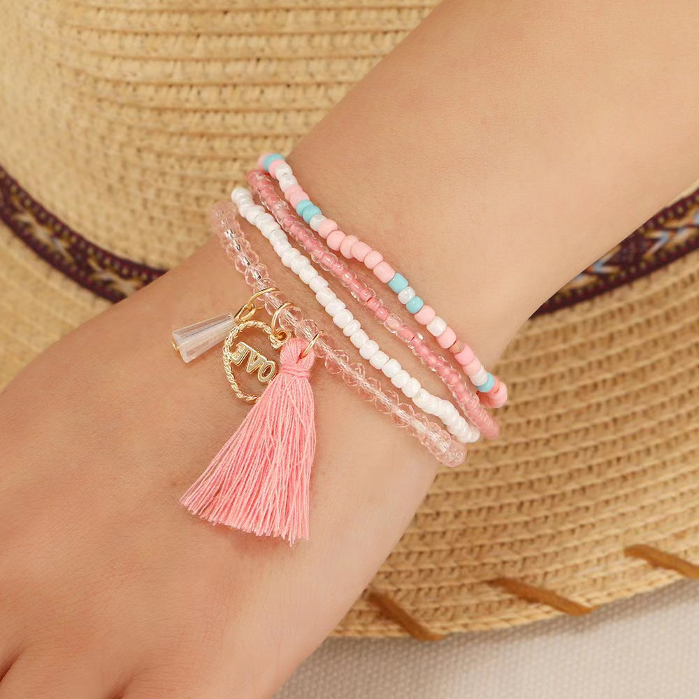 Pulsera de borla rosa con corazón de amor de aleación bohemia
