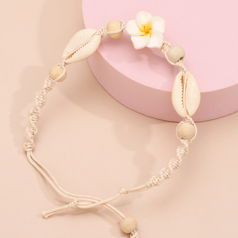 Tobillera con diseño floral de conchas tejidas a mano de estilo bohemio