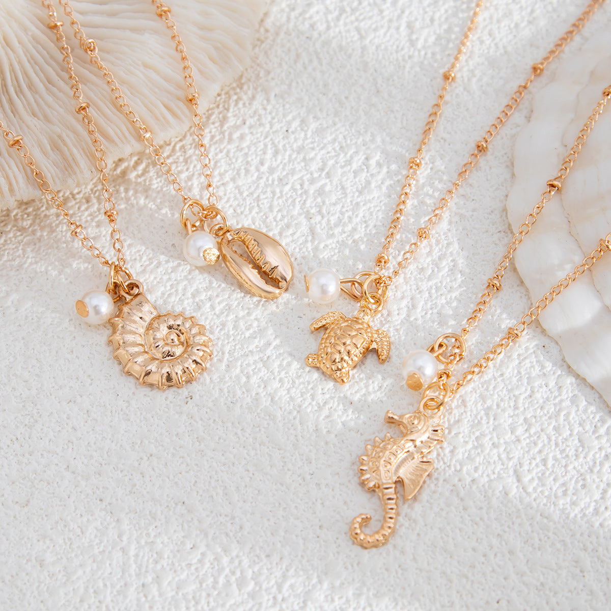 Conjunto de collar de perlas de aleación con diseño de tortuga y caballito de mar para mujer