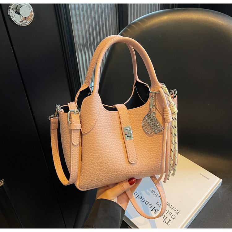 Sac à main seau décontracté de couleur unie pour femme avec motif litchi