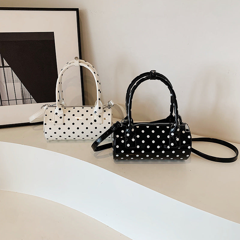 Bolso de hombro cilíndrico portátil con punta ondulada de moda