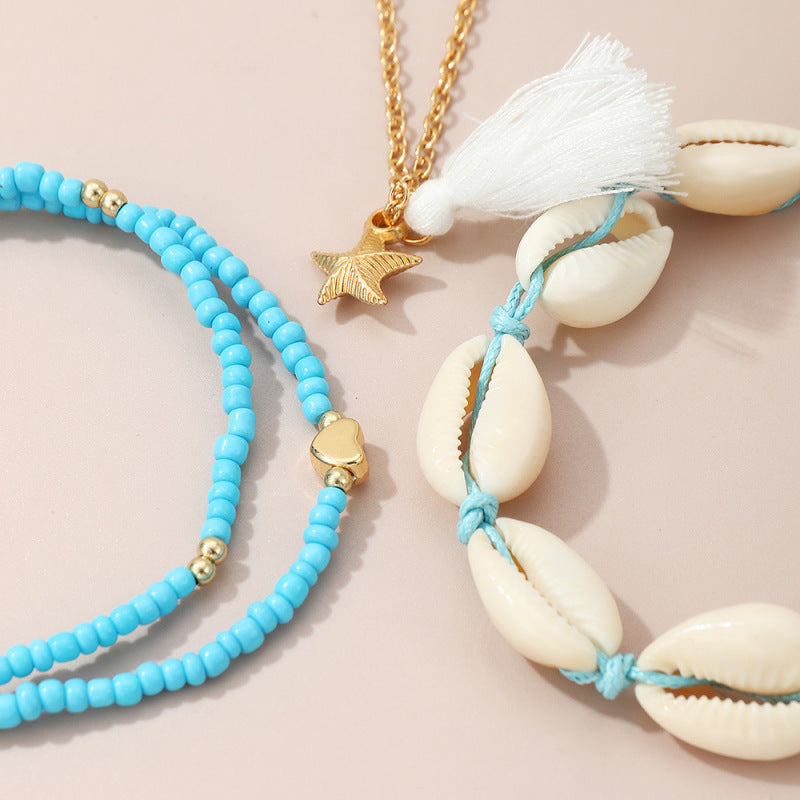 Conjunto de tobilleras bohemias multicapa con cuentas y conchas