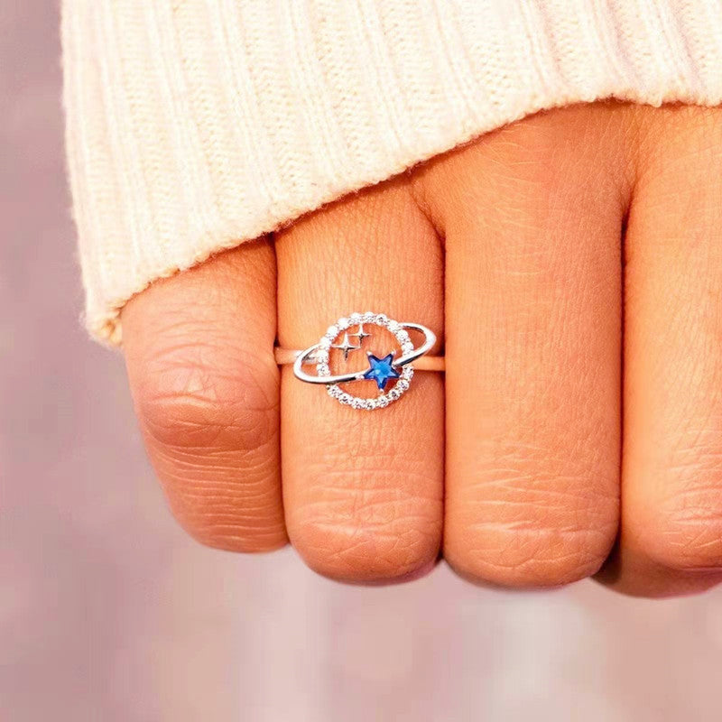 Anillo de aleación con forma de estrella de circonita azul para mujer, estilo viento de ensueño