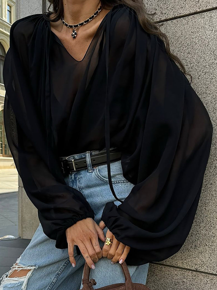 Chemisier noir à lacets et manches longues pour femme