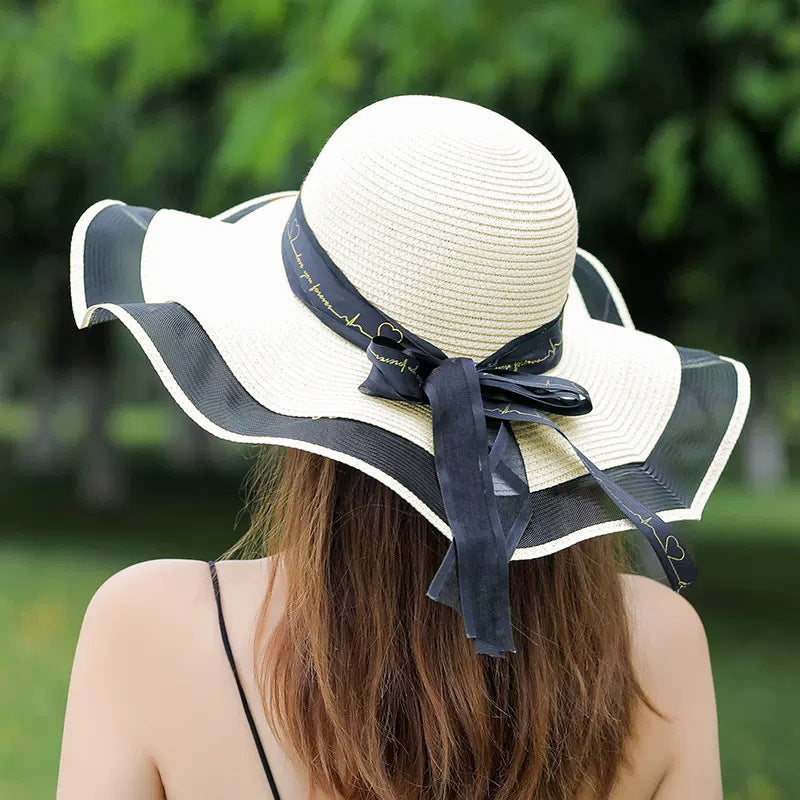 Sombrero de paja con lazo para playa, vacaciones y moda de verano para mujer