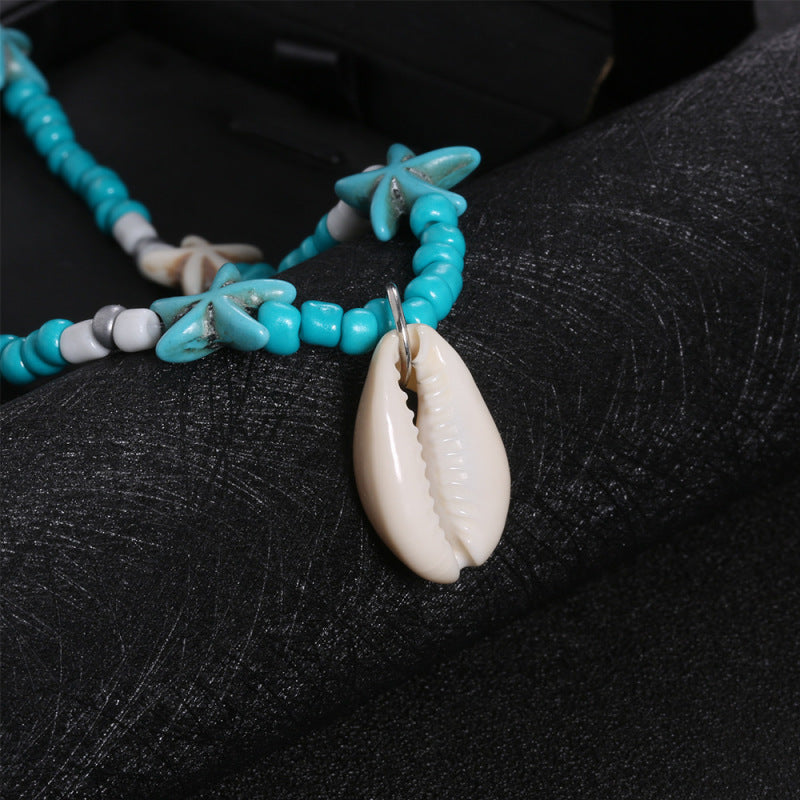 Collar de conchas con cuentas turquesas de Bohemia