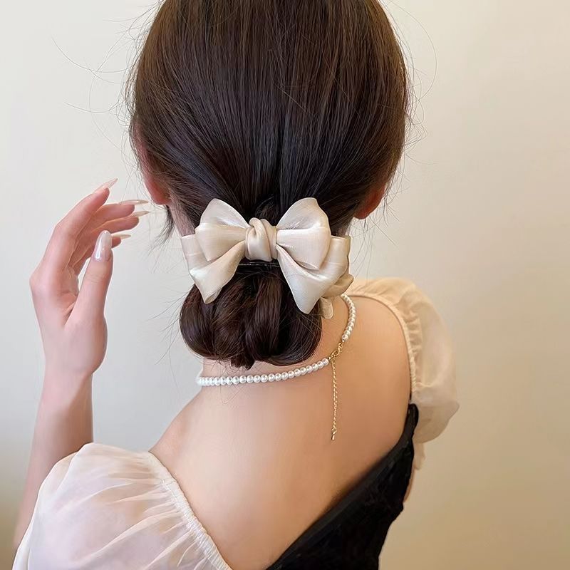 Elegante broche con lazo de color liso para mujer