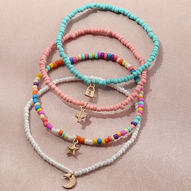 Conjunto de tobillera con cuentas multicolores bohemias y estrella creciente