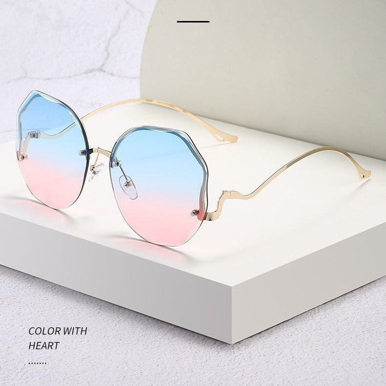 Gafas de sol sin marco con borde de arco metálico poligonal de moda