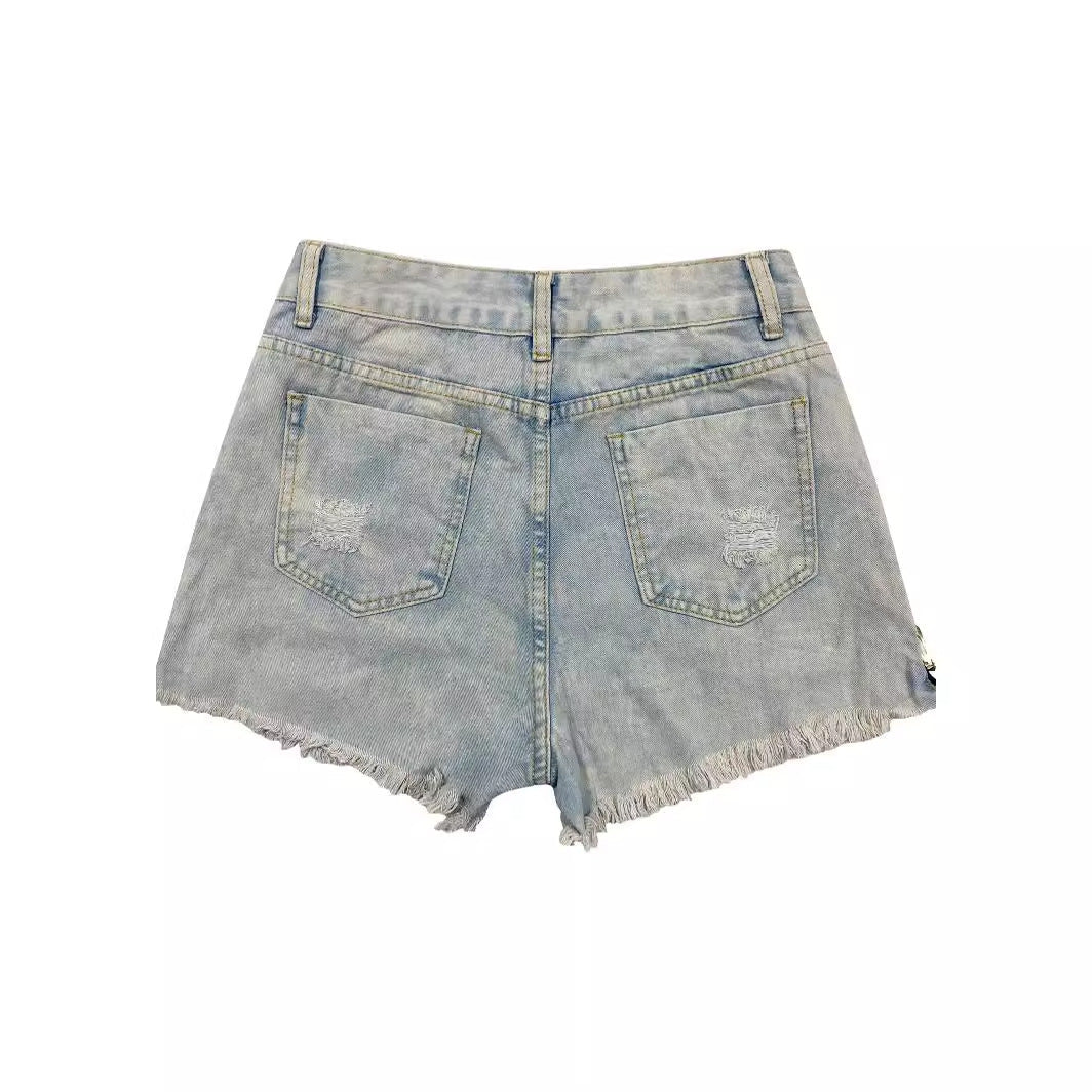 Short en jean déchiré sexy à fermeture éclair latérale pour femme