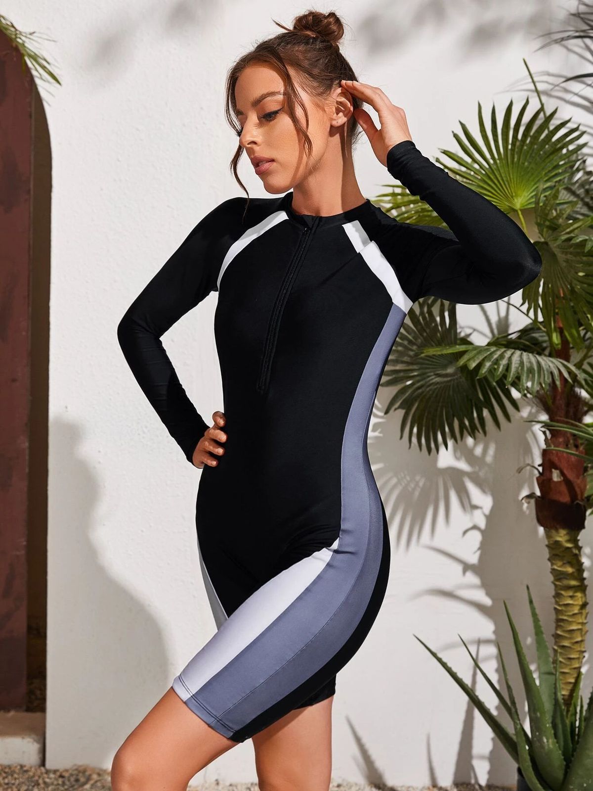 Maillot de bain une pièce sport à manches longues et fermeture éclair pour femme