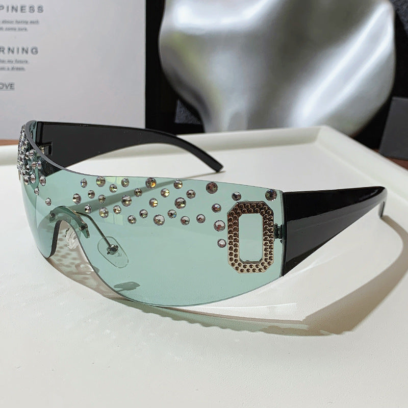 Gafas de sol de moda sin marco de un solo cuerpo con diamantes de imitación