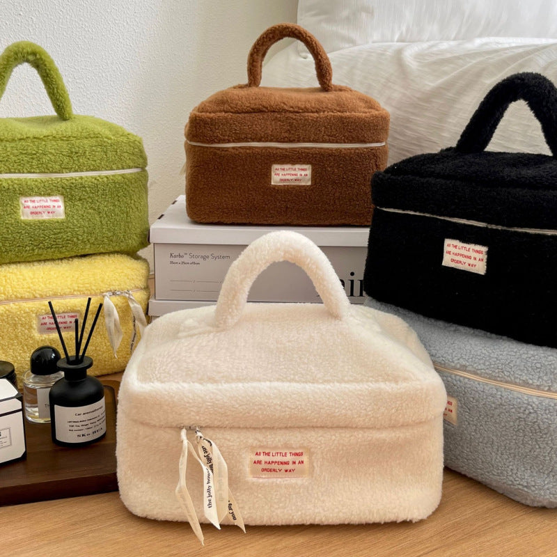 Bolsa de cosméticos de felpa con cremallera de moda para mujer