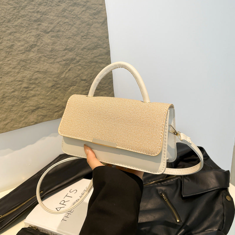 Bolso de mano con costuras abatibles de moda - Tendencia urbana