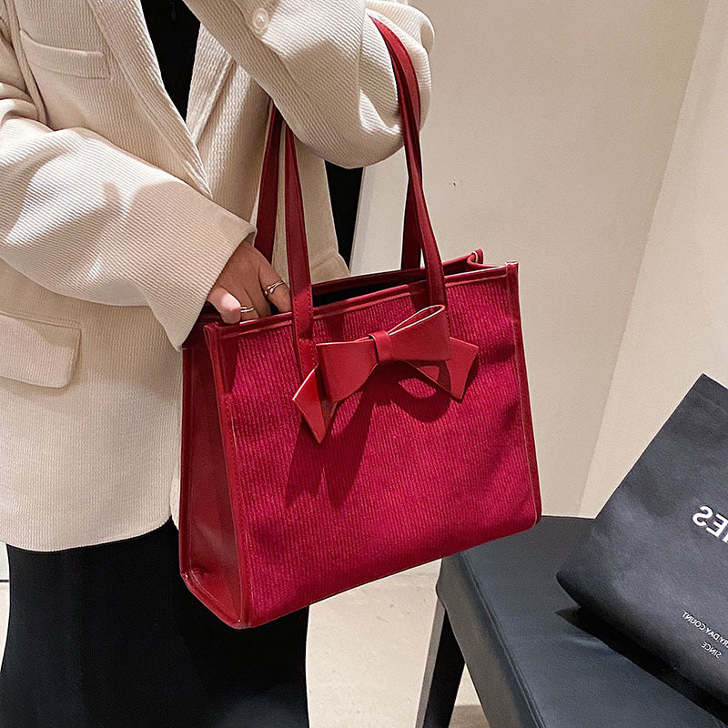 Bolso de mano de verano para mujer, de color liso y moderno.