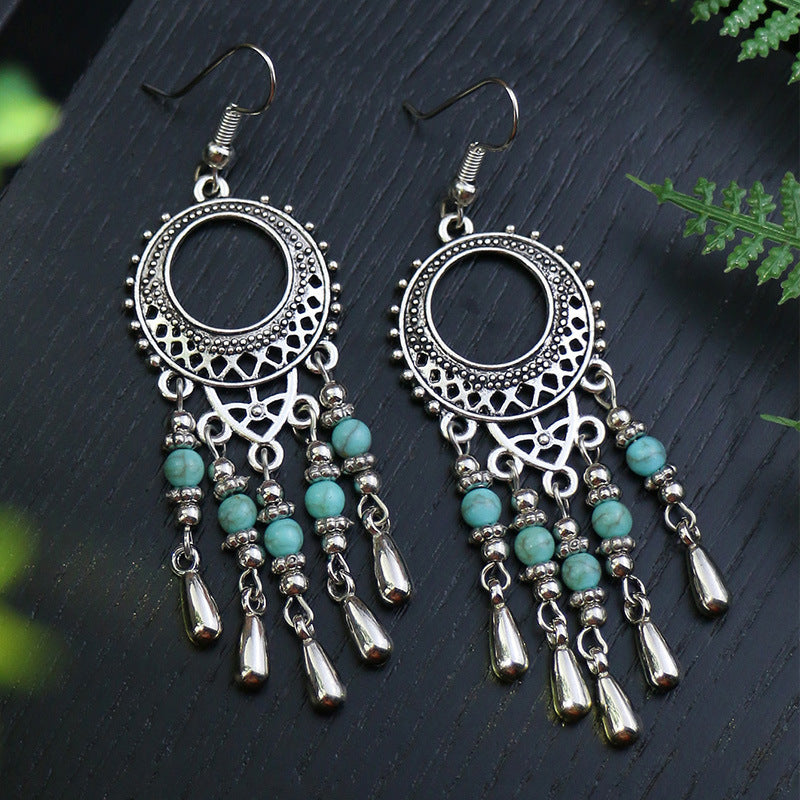 Boucles d'oreilles longues bohèmes en forme de goutte turquoise