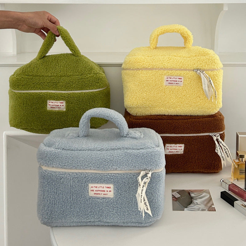 Bolsa de cosméticos de felpa con cremallera de moda para mujer