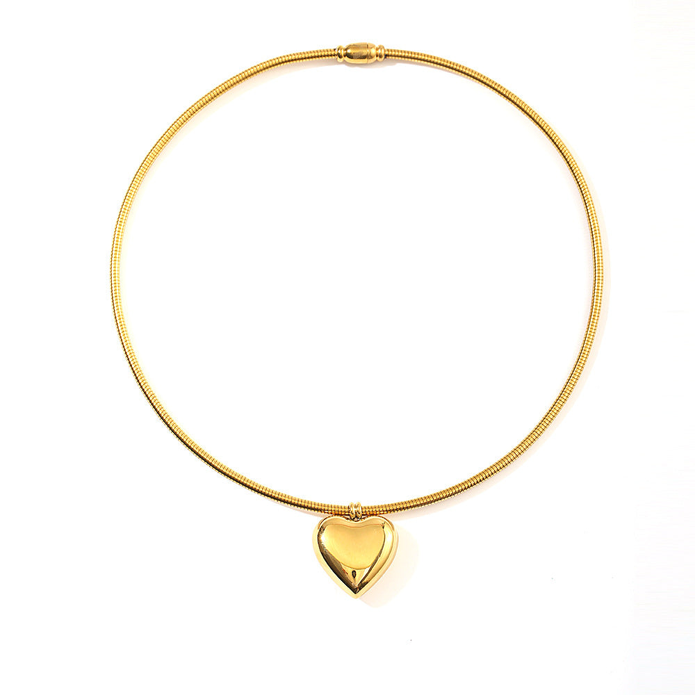 Collar circular sencillo de acero y titanio con forma de corazón de 18 quilates para mujer