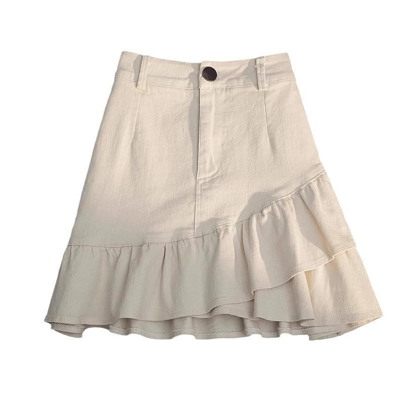 Falda vaquera con volantes irregulares de color liso sexy a la moda para mujer