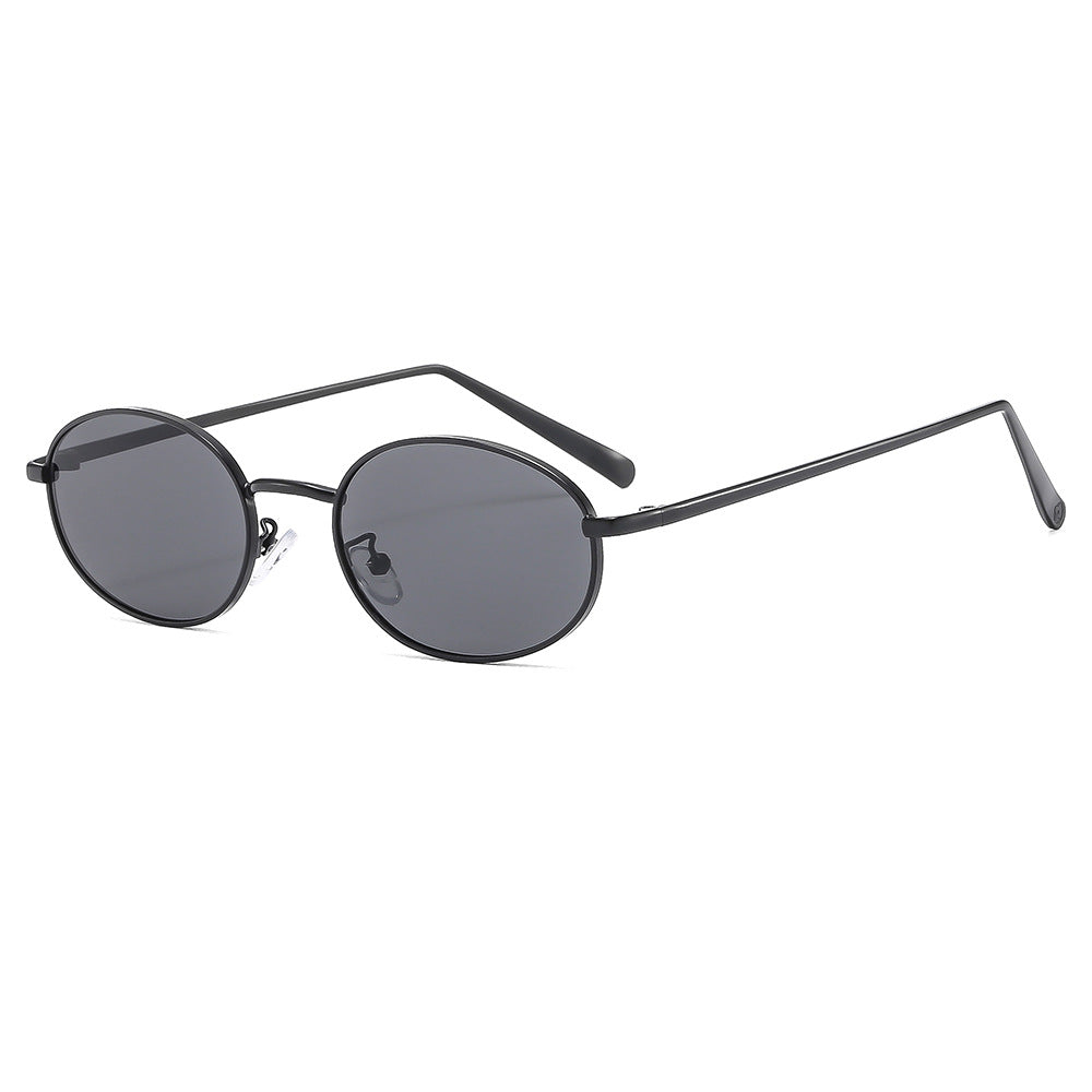 Gafas de sol ovaladas retro con montura metálica elegante