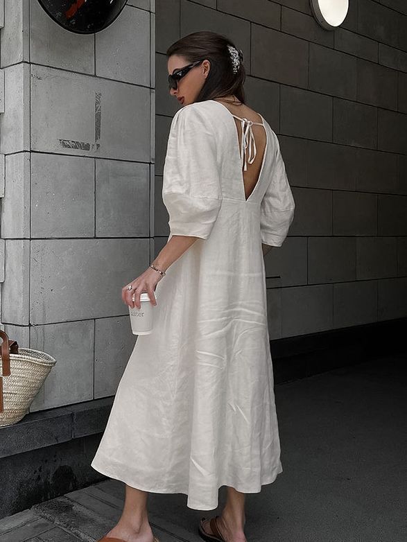 Elegante vestido de lino y algodón con escote en V en color liso