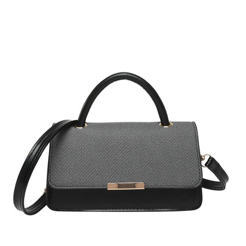 Bolso de mano con costuras abatibles de moda - Tendencia urbana