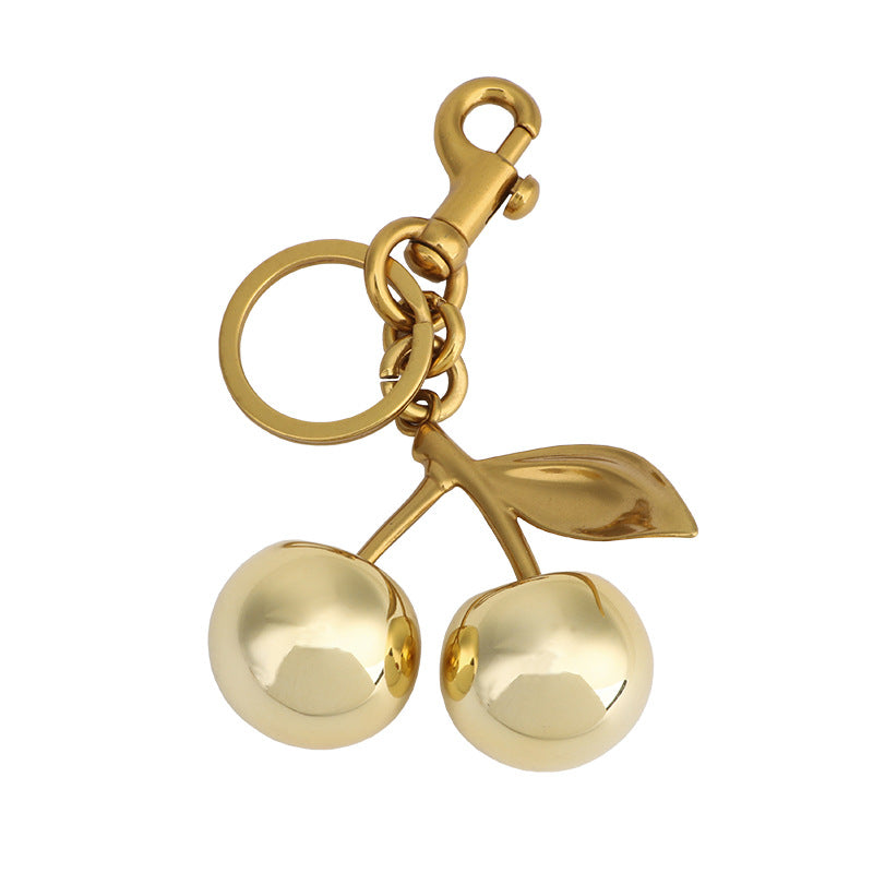 Llavero con colgante de cereza dorada para bolso de mujer, aleación de zinc, estilo frutal