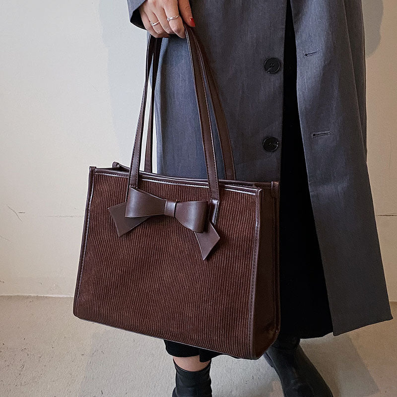 Bolso de mano de verano para mujer, de color liso y moderno.