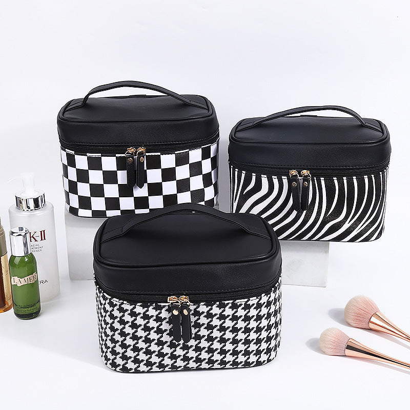 Bolsa de cosméticos de pata de gallo de moda en blanco y negro