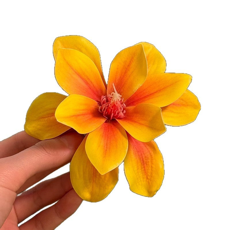 Horquilla floral amarilla para vacaciones en la playa