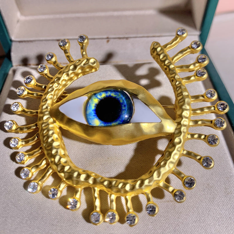 Broche rétro exagérée œil du diable pour femme