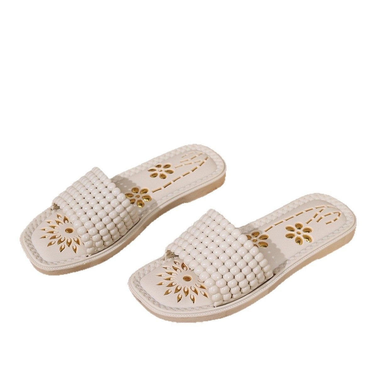 Chaussons plats creux tendance avec motif floral et tige en PVC
